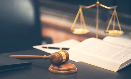 A lawyer or legal official desk with stationary related to law profession